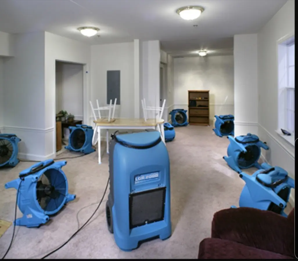 Air movers and dehumidifier setup for Water Damage Restoration in Garden Home-Whitford